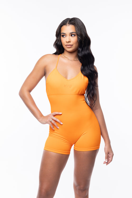 Load image 1 in gallery view. TANGERINE ROMPER